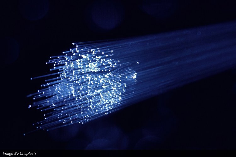 High-speed fiber optic cables glowing blue representing fast data transfer and the impact of website speed and SEO performance.